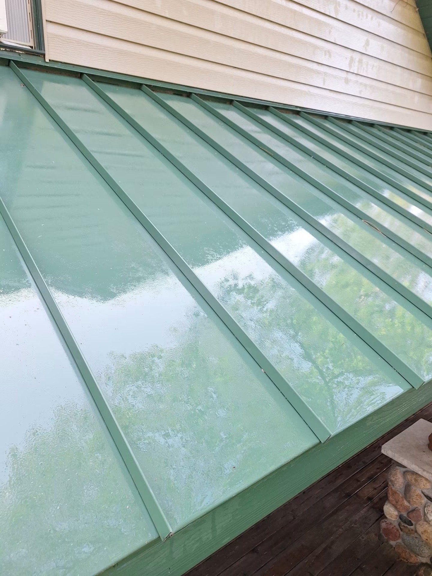Metal roof cleaned by soft wash
