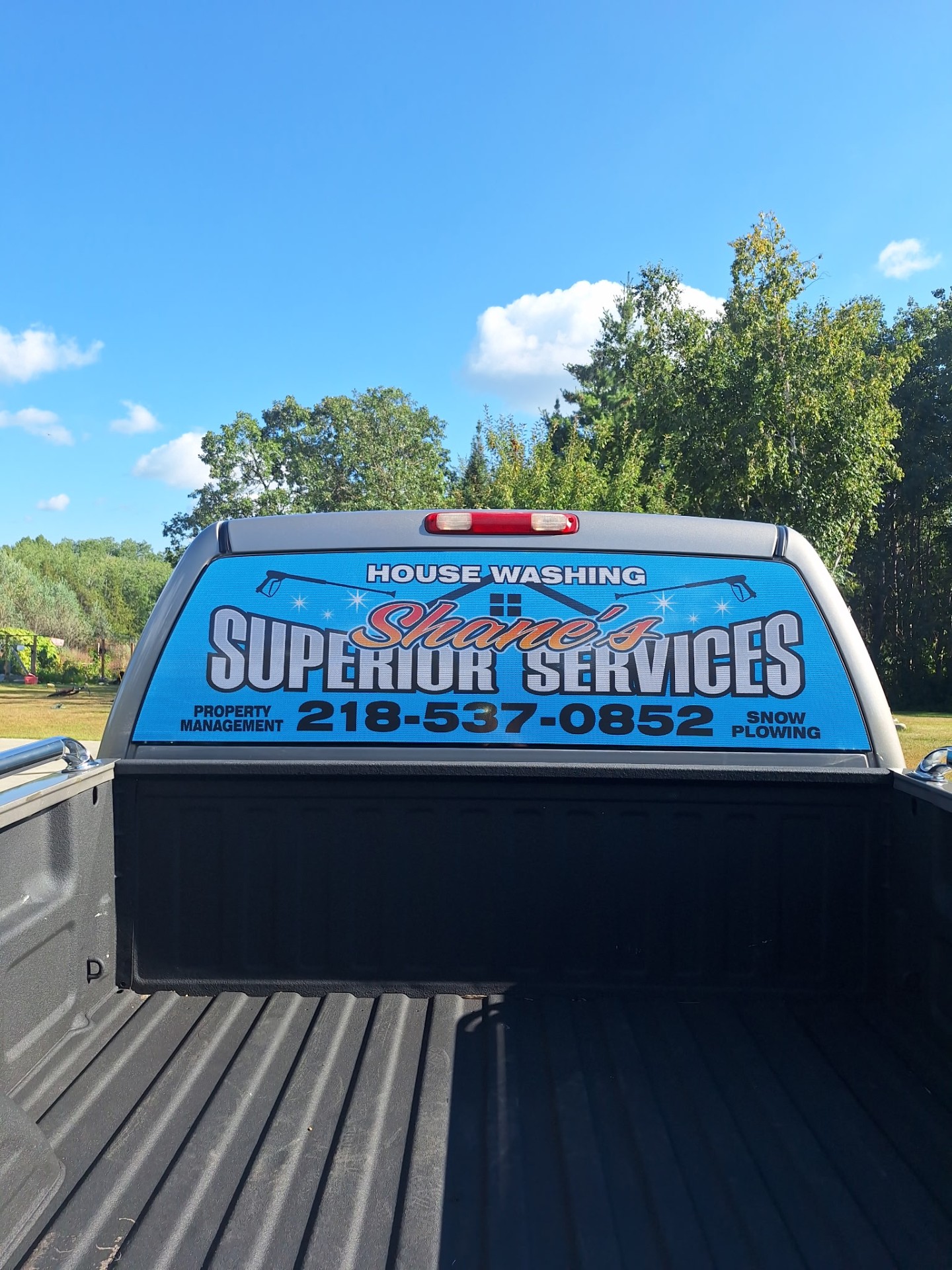 Shane's Superior Services work truck with company signage